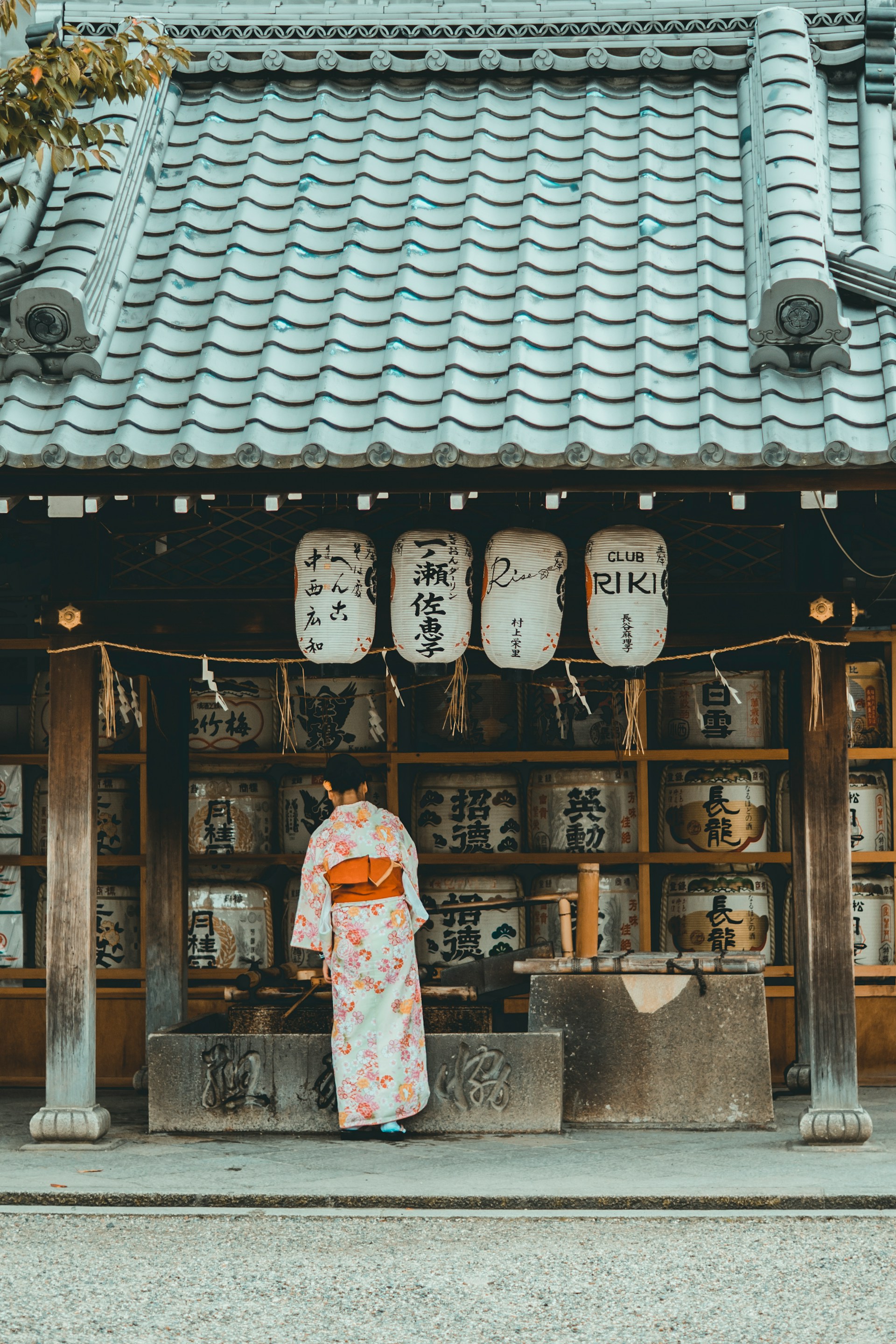 Women wearing orange and white kimono dress